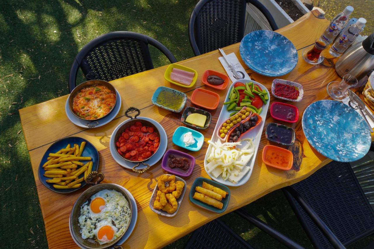 Qcunda Otel Ayvalı Esterno foto